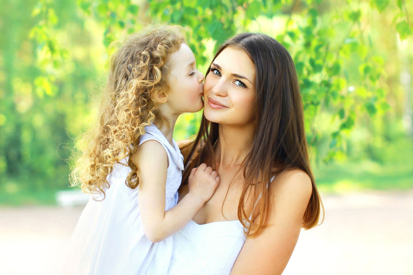 Happy Mother Holding Daughter - Positive Affirmations for Moms