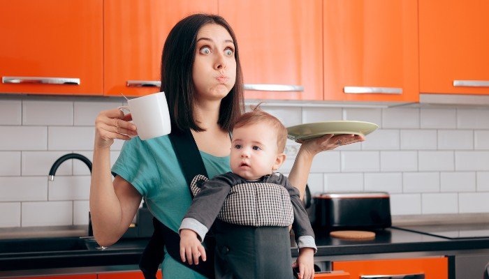 Overwhelmed Mom with Baby in Kitchen